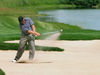 Man playing golf